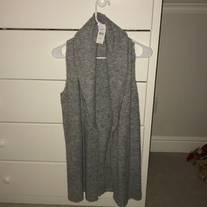 A sweater/vest never before worn
